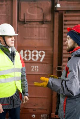 Worker Talking to Supervisor in Docks